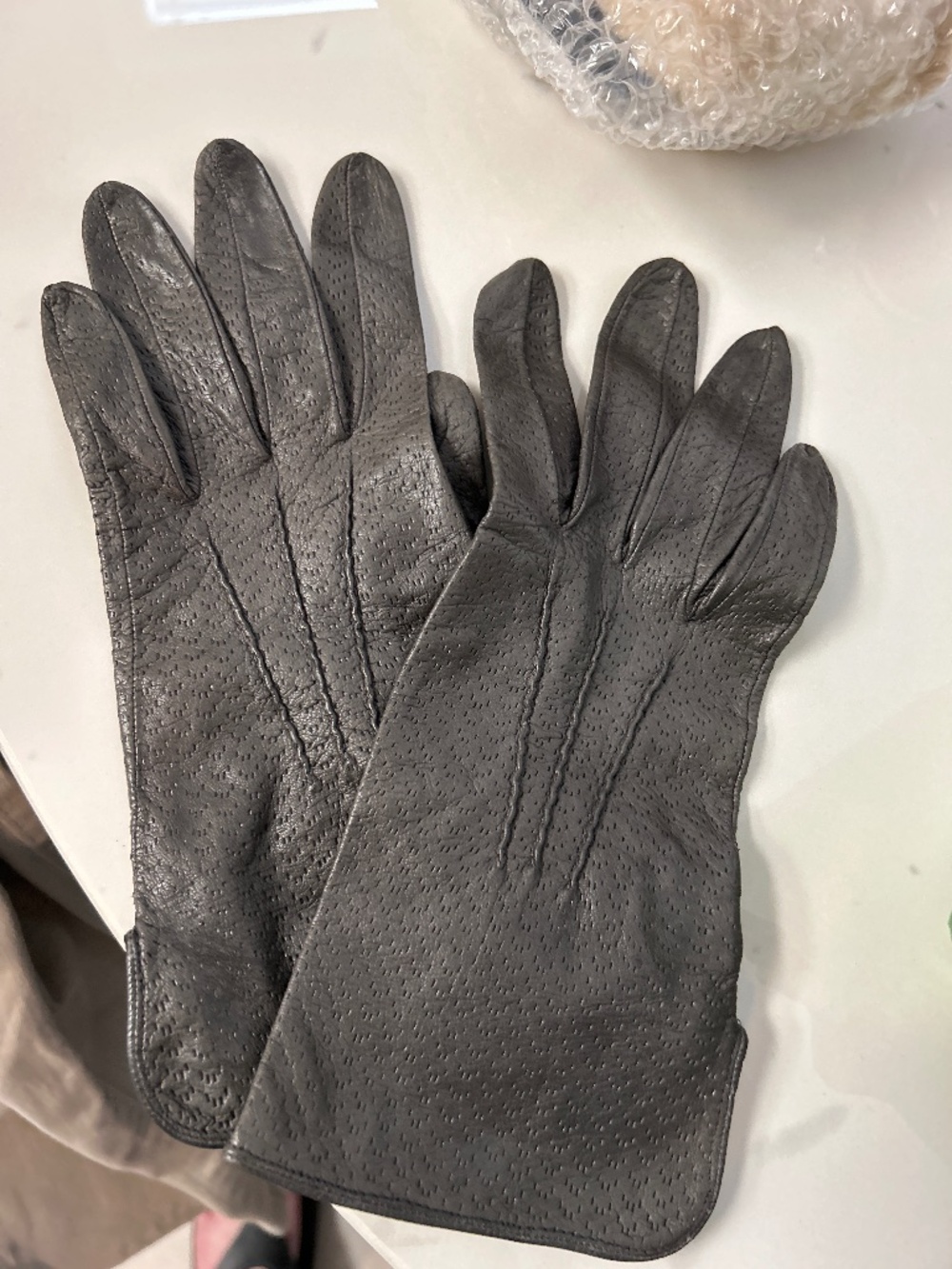 Dark gray leather gloves (unlined)